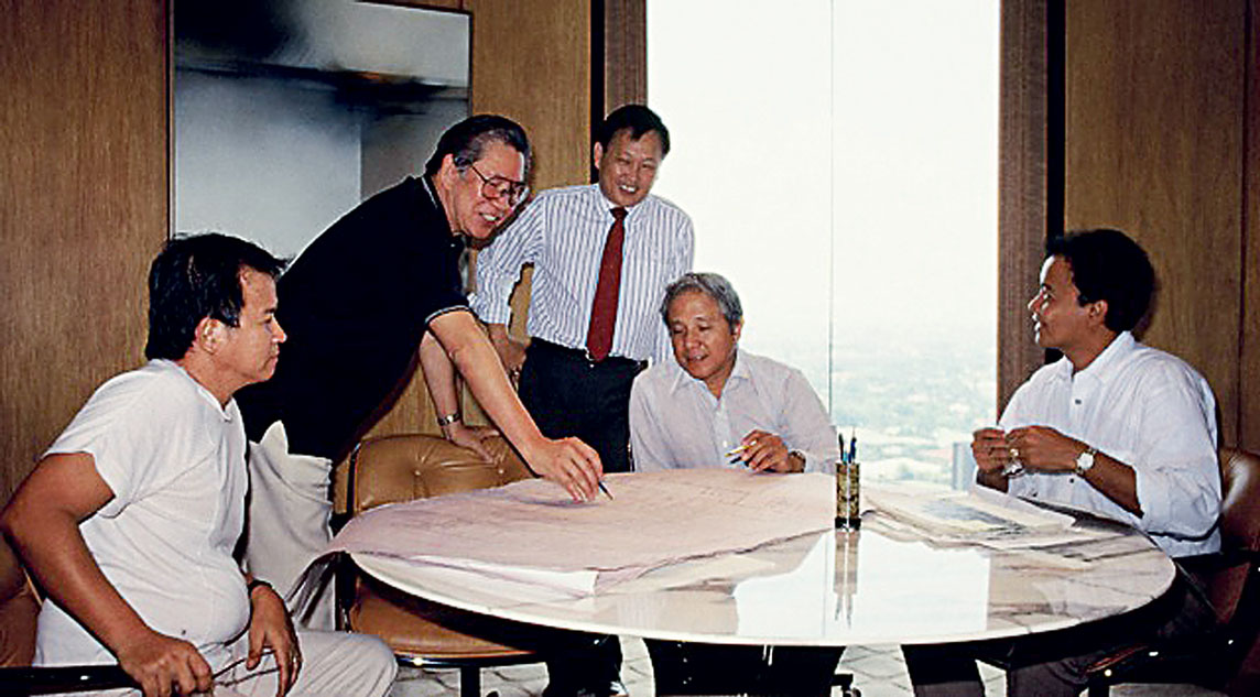 The Partners in the photo, left to right: Edgardo "Ed" Ledesma Jr., Leandro "Lindy Locsin", Raul Locsin, Ruben "Ben" Protacio, and Orlando "Orly" Mateo having fun discussing plans around the marble table | Photo courtesy of 