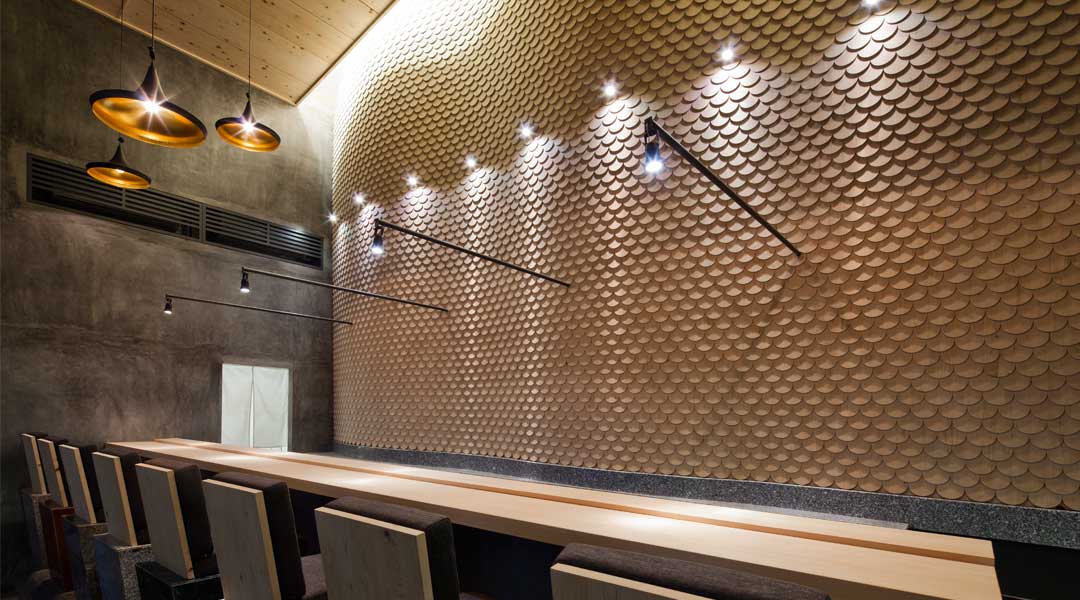 The undulating backdrop at the sushi table is one of the defining features of Sushi Rei in Ho Chi Minh City, Vietnam.